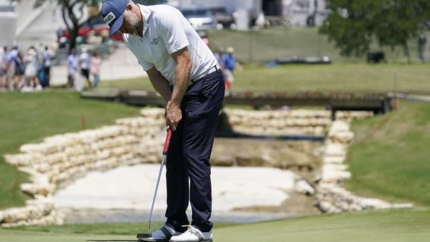 May 13, 2022; McKinney, Texas, USA; David Skinns putts for birdie on the 18th green during the second round of the AT&amp;T Byron Nelson golf tournament. Mandatory Credit: Raymond Carlin III-USA TODAY Sports
